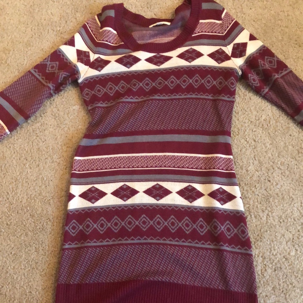 Sweater dress with maroon, white, and grey design